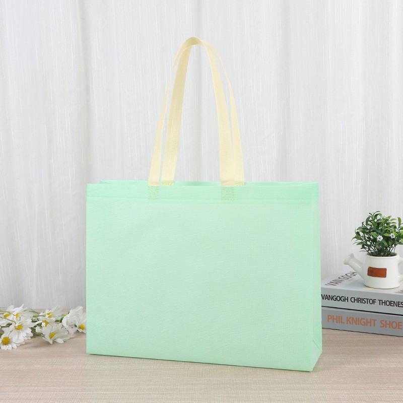 Bolsas de tela no tejida tiendas de souvenirs de viajes de madres y bebés en línea bolsa de compras de mano engrosada bolsa de mano image 16
