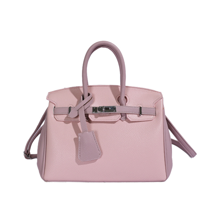 Bolso de platino portátil de litchi para mujeres 2026 comercio exterior nuevo estilo de alto nivel de sensación de tamaño de estilo de hombro mochila