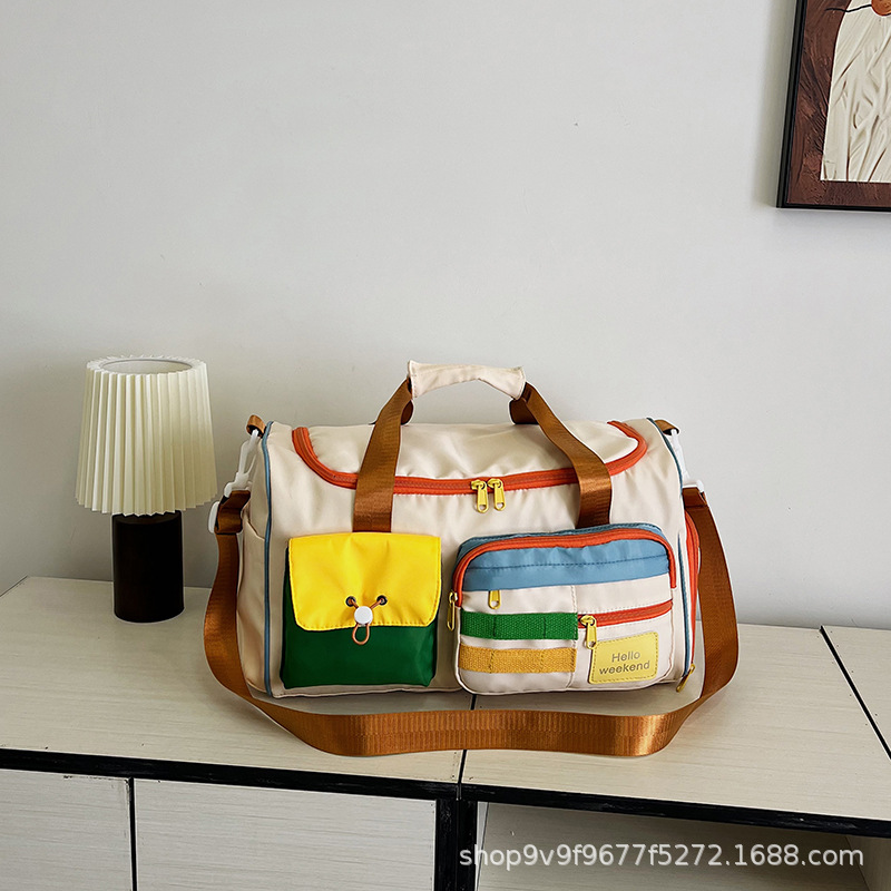 撞色斜挎运动健身包大容量旅游手提行李包时尚外出短途旅行包