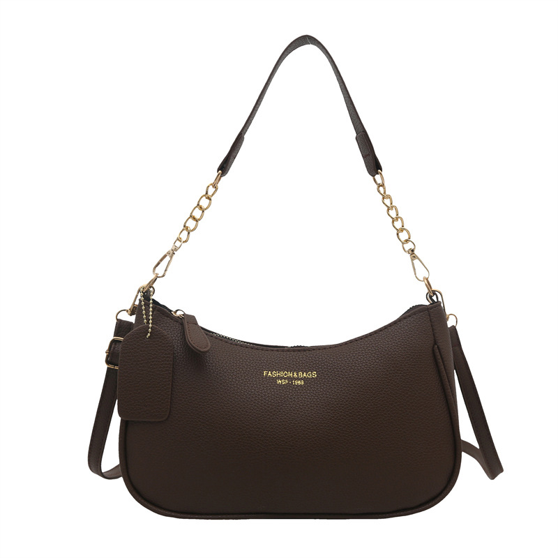 Bolsos debajo de las axilas para mujeres 2025, nueva moda de moda bolso de hombro textural damas primavera lichi patrón bolso de trabajo pequeño