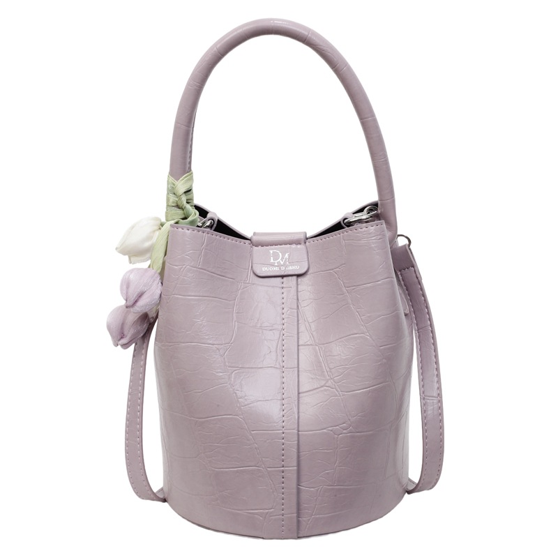 Bolso de cubo de jardín de verano 2025 nuevo bolso de mano estilo extranjero bolso de hombro con patrón de piedra pequeño bolso de mensajero fresco para mujer