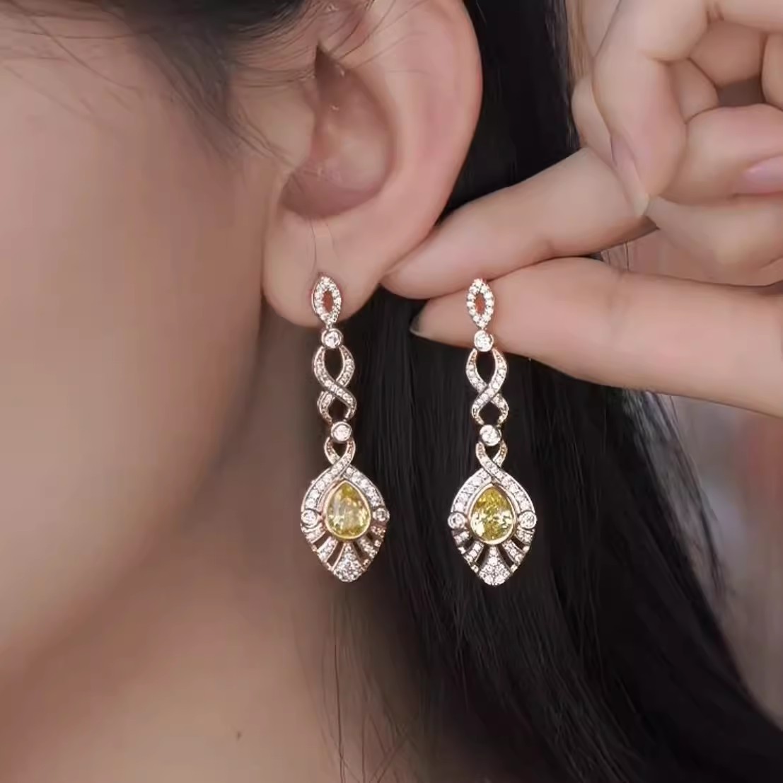 Xuping Caibao serie de aretes de gota de agua ligero lujo temperamento pendientes de cobre aleación de aretes de viento retro al por mayor mujeres