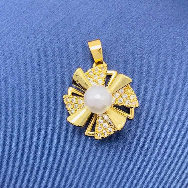 2022 nuevo trébol giratorio simple cien colgante fuente joyería fábrica al por mayor directa sin cadena