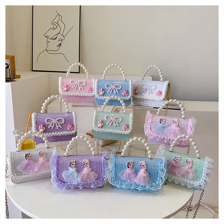 2025 nuevo lindo arco princesa bolsa de perlas portátil moda versátil mochila de hombro bolso de cambio coreano