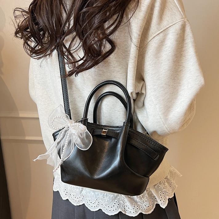 Nicho Zhong bolso de pulsera de brazalete para mujeres 2025, nuevo tipo de mochila de viaje, diseño de tendencia, bolso de cubo de alta calidad