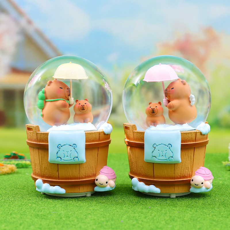 Caja de música de bola de cristal de Kapibala ingenua y linda, adornos de escritorio luminosos, nieve que cae, regalo de cumpleaños para estudiantes y niños