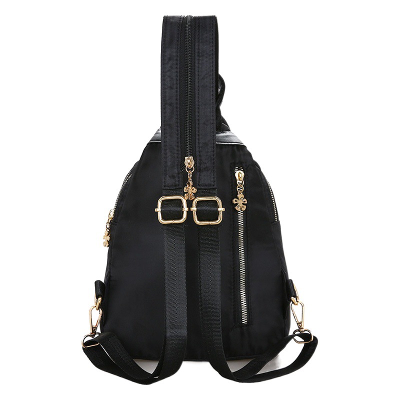 Mochila femenina impresa 2024 de gran capacidad, multifuncional y portátil, ideal para viajes, OEM transfronterizo