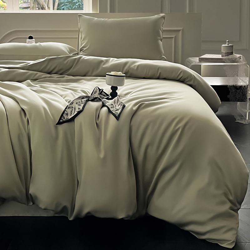 Juego de cama de verano de cuatro piezas de seda de hielo de lujo ligero 2025 nueva funda de edredón sábana sábana sábana ropa de cama desnuda sedosa