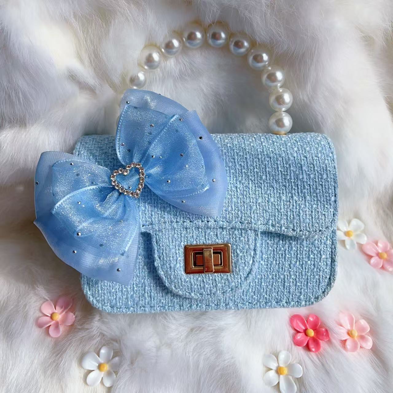 Nuevo tipo de bolsos para niños, bolsos de moda, bolsos de princesa de viento, bolsos portátiles lindos para chicas, bolsos de red para bebés.