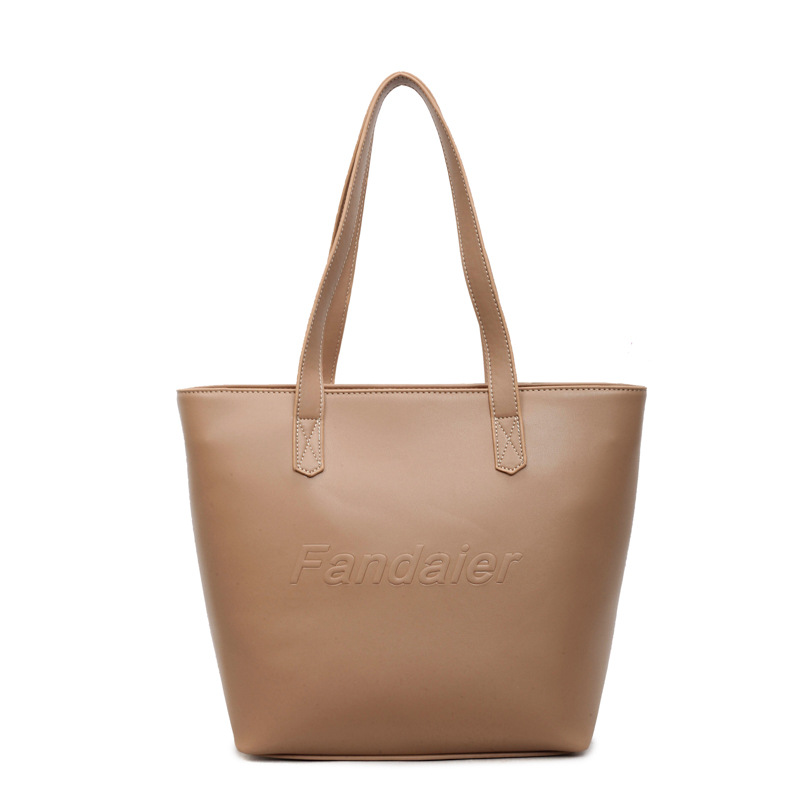Casual gran capacidad bolso tote para mujeres 2026 venta caliente nueva ciudad simple moda versátil bolso de hombro axilar