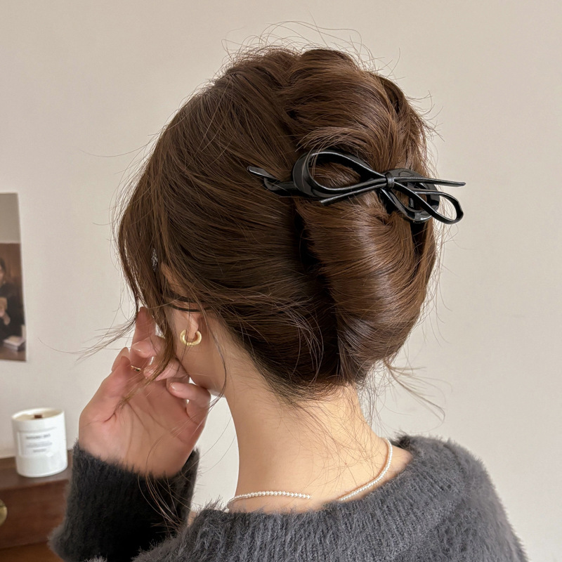 Alto grado de sensación de leopardo arco torsión clip de cabello temperamento disco de cabello una palabra agarrar clip de cabello para mujeres 2025 nuevo toque de cabello