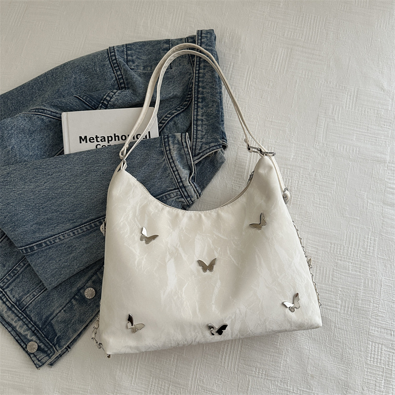 Mochila de viajes de gran capacidad para mujeres 2024 nueva moda mariposa brazo bolso de hombro bolso de cadena universal