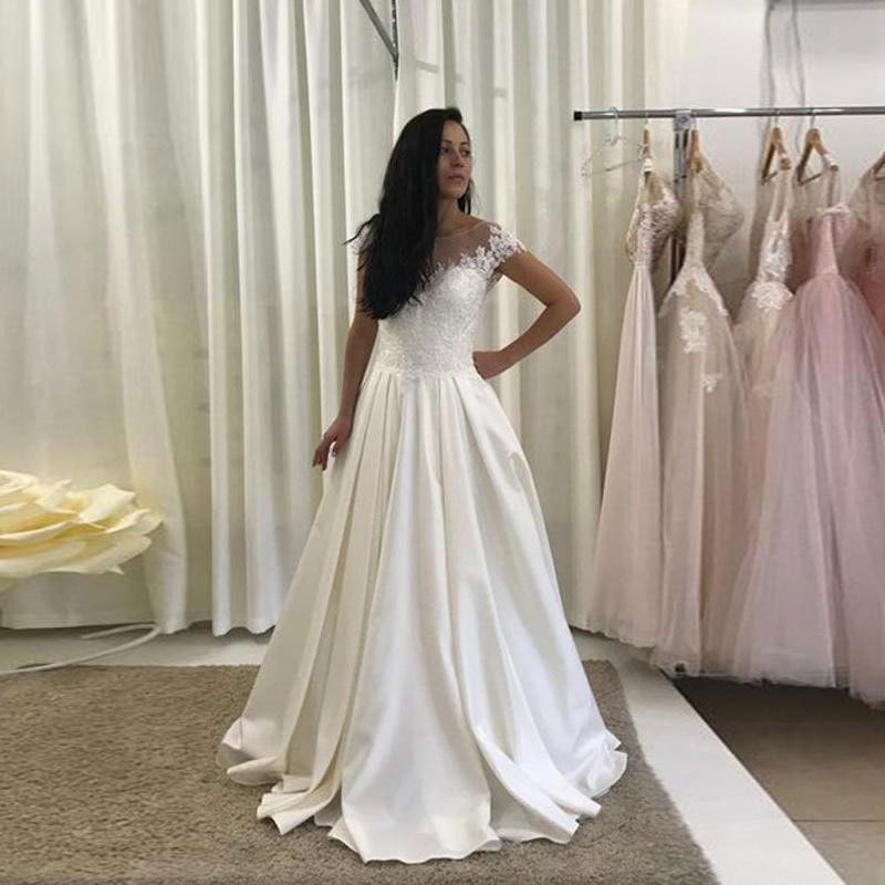 El Comercio exterior europeo y americano Amazon AliExpress desea nuevo vestido de novia de encaje cuello redondo línea temperamento adelgazante personalizable image 1