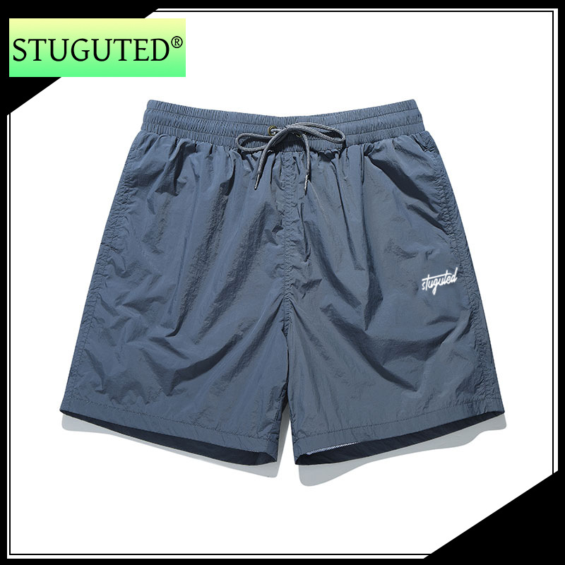Stuguo Trendy Brand 2025 Summer Quick-Drying Ice Silk Printed Men's Shorts, Comfortable and Versatile Breathable Beach Pants for Youth