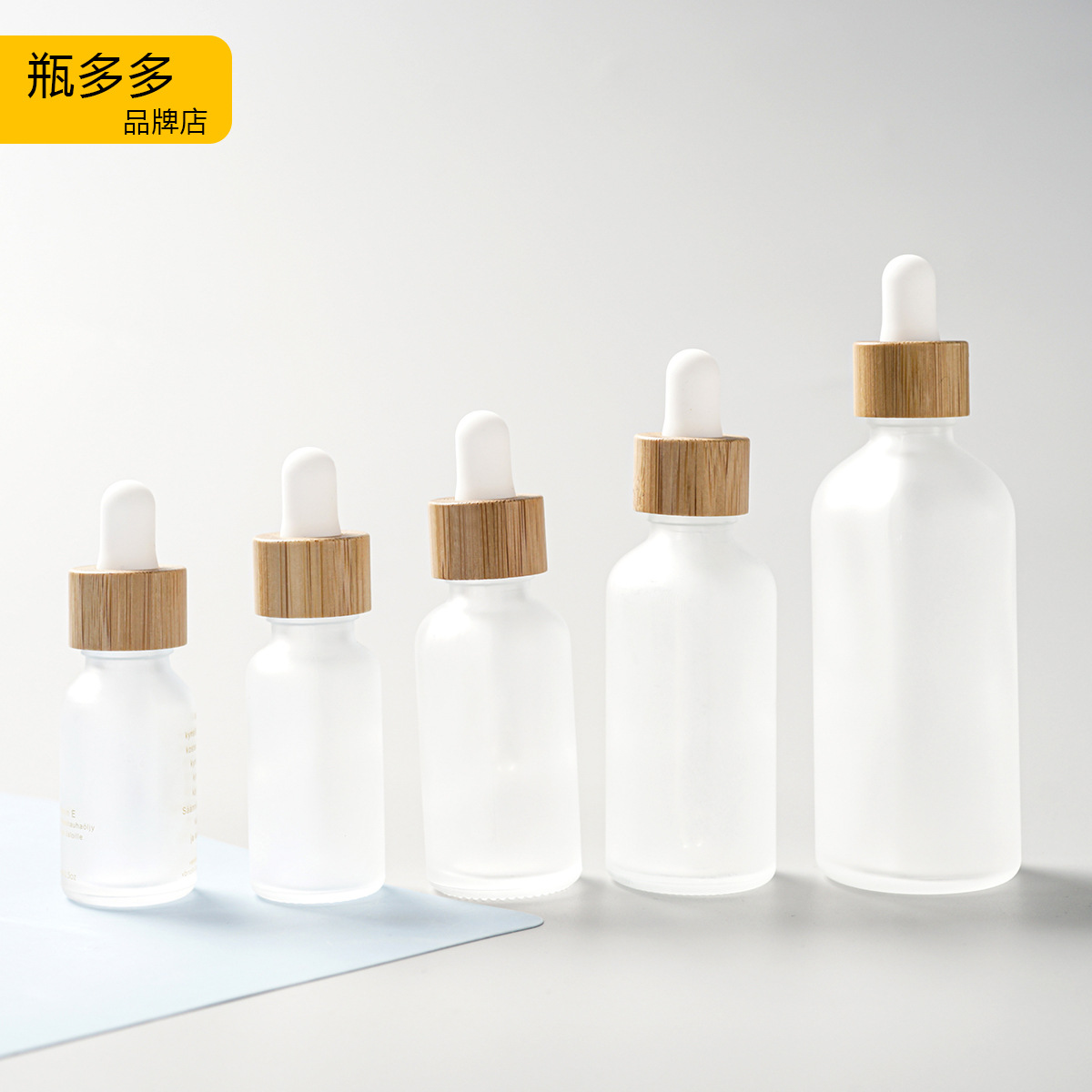 Cubierta de madera de bambú botella cosmética botella sub-botella esencia botella cuidado de la piel Paquete de envases de vidrio esmerilado botella cuentagotas botella de aceite esencial