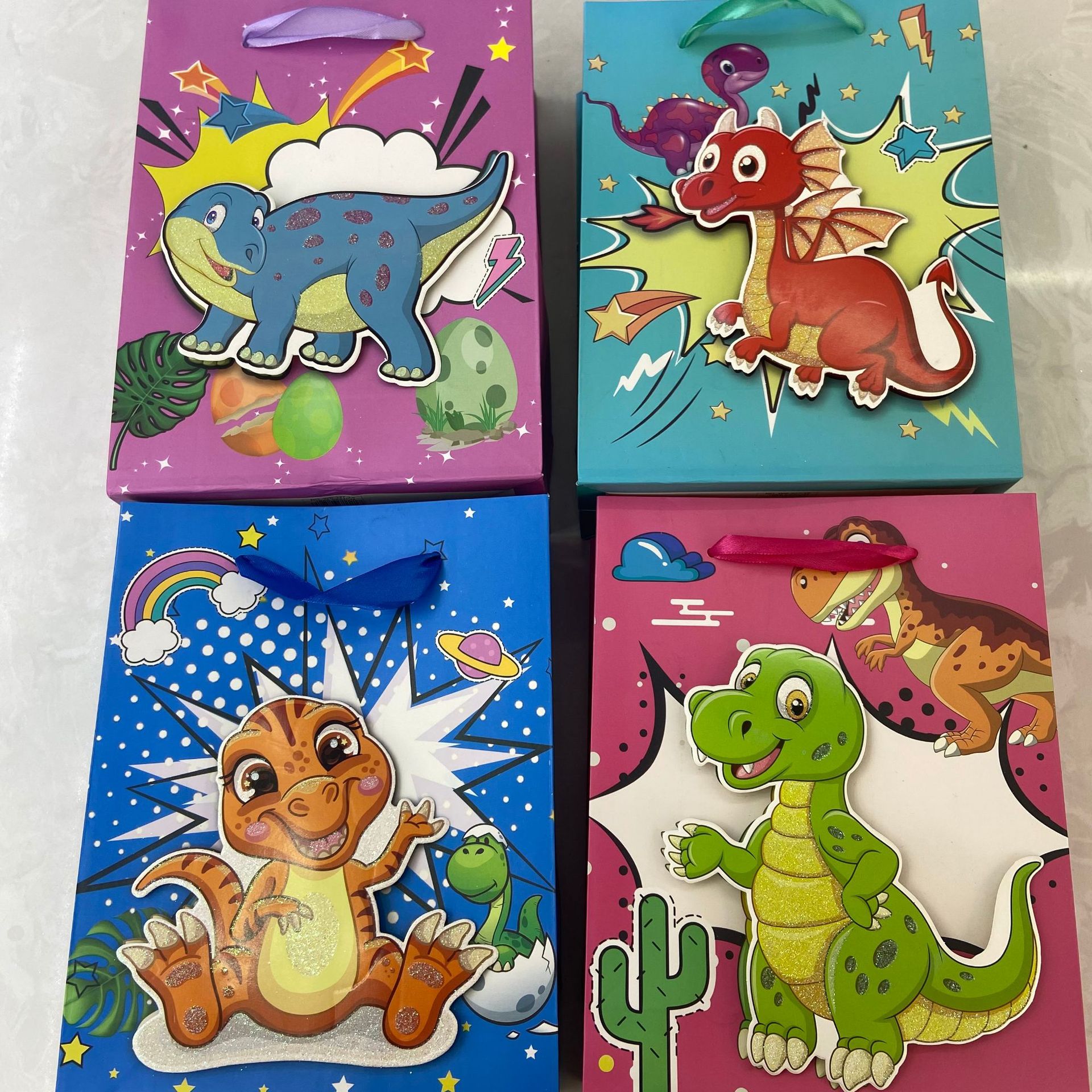 跨境儿童卡通礼品购物袋恐龙图案生日礼物包装纸袋手提礼物袋