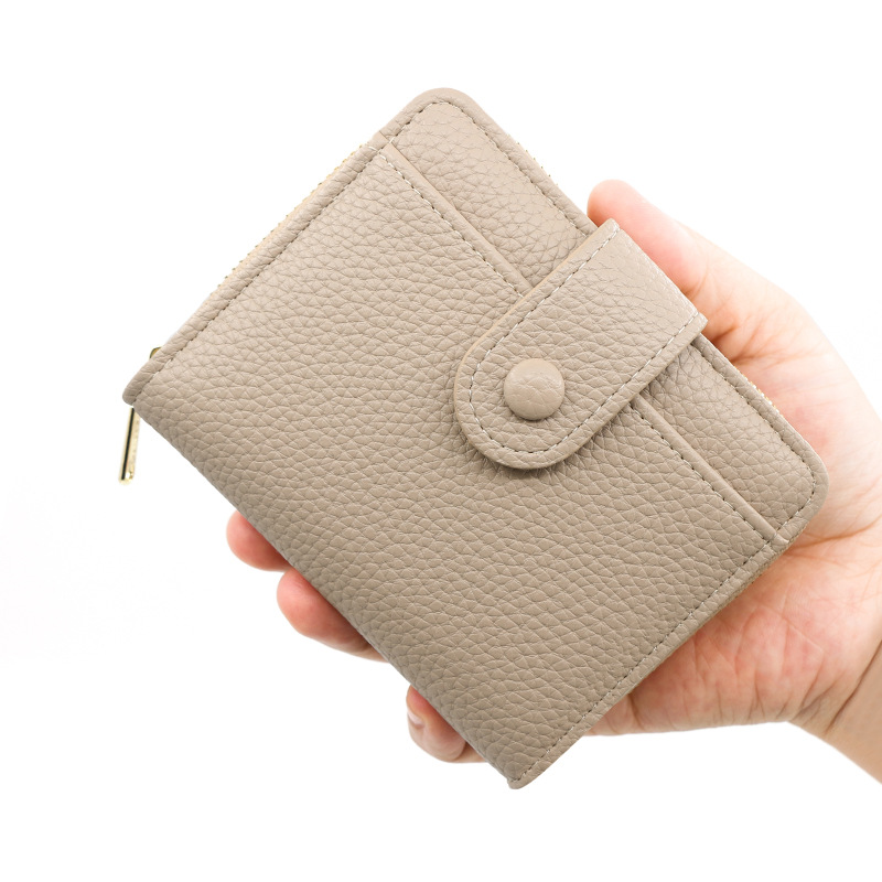 Nueva cartera transfronteriza de las mujeres simple patrón lychee cremallera monedero corto chica cartera al por mayor
