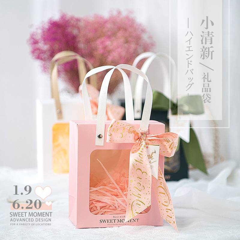 Bolsa de papel de ventana al por mayor estilo ins bolsa de papel de tamaño pequeño bolso de regalo de mano bolso de regalo transparente bolsa de regalo de tarjeta blanca