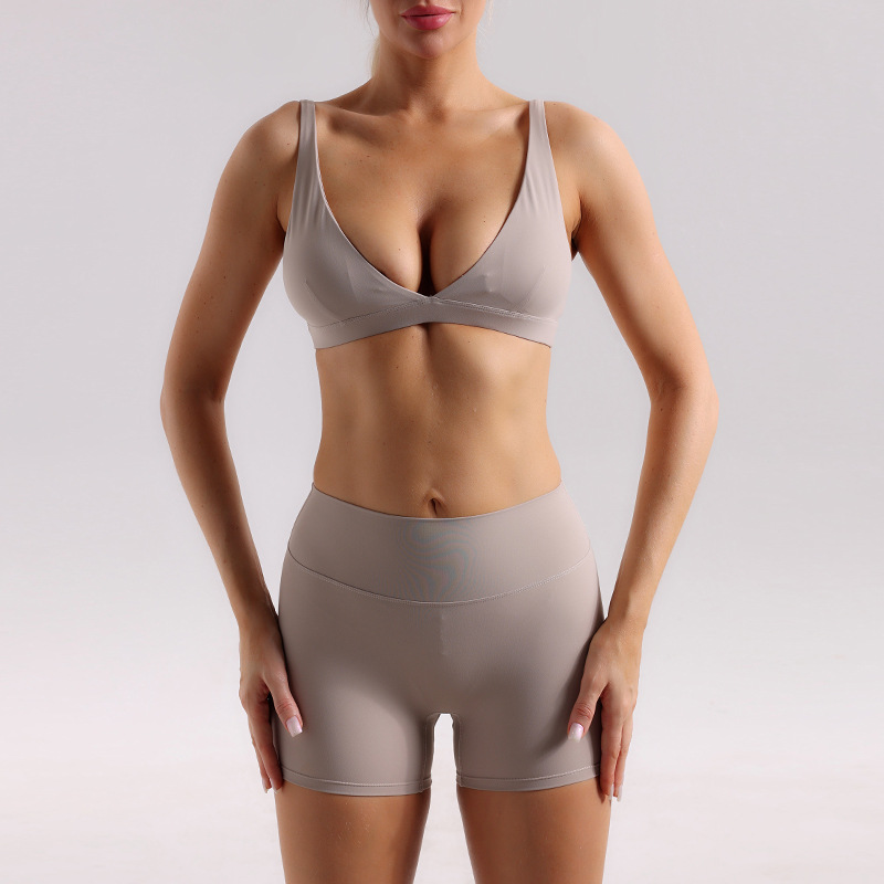Traje de ropa de yoga desnudo para mujer Sujetador deportivo de espalda hermoso a prueba de golpes en V profundo de cintura alta, abdomen y caderas, pantalones cortos de yoga para correr