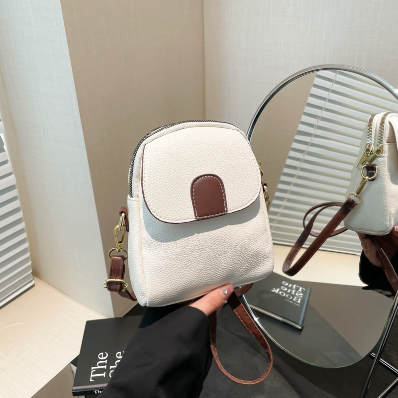 2024 invierno nuevo estilo de moda extranjero bolso de hombro bolso de moda para mujeres bolso de teléfono móvil bolso de mochila europea y americana bolso pequeño