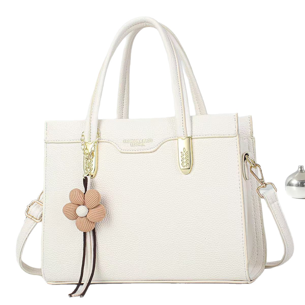 Color sólido temperamento bolso de mano flor de moda colgante bolso de hombro de gran capacidad bolsas transfronterizas