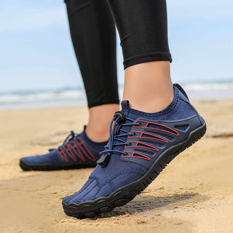 Zapatos de playa transfronterizos de pareja transpirables antideslizantes y rápidos, cinco dedos, zapatos de surf, zapatos de buceo, descubierto al por mayor.
