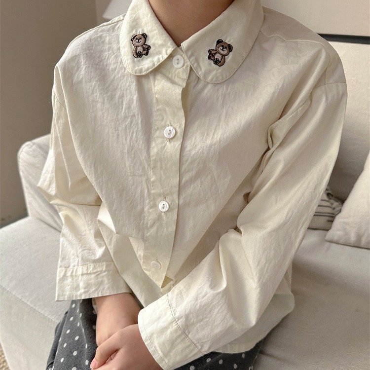 Zuo Xiaoran ropa para niños 2024 ropa de primavera camisa para niños solapa de manga larga Oso de dibujos animados bordado camisa blanca