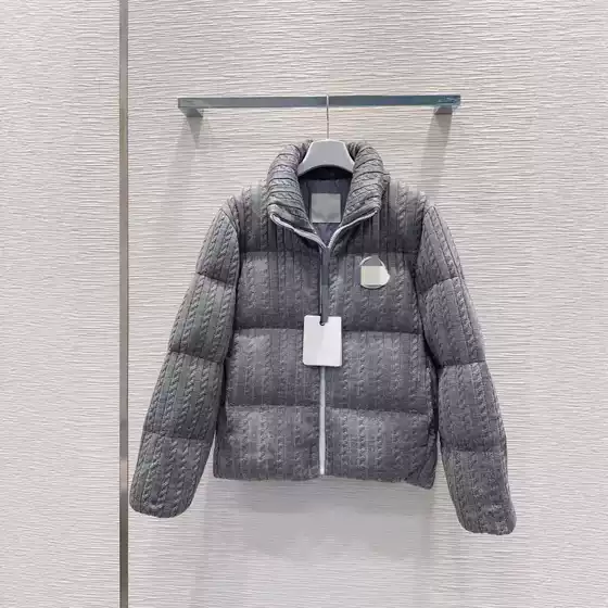 Shenzhen Nanyou 25 autumn and winter fashionable temperament letter micro label splicing stand collar wool knitted down jacket for women