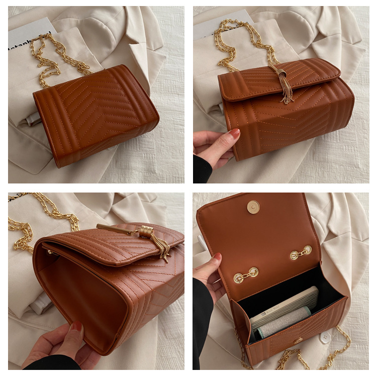Borsa a tracolla donna con ricamo catena e nappine elegante_voghion.com