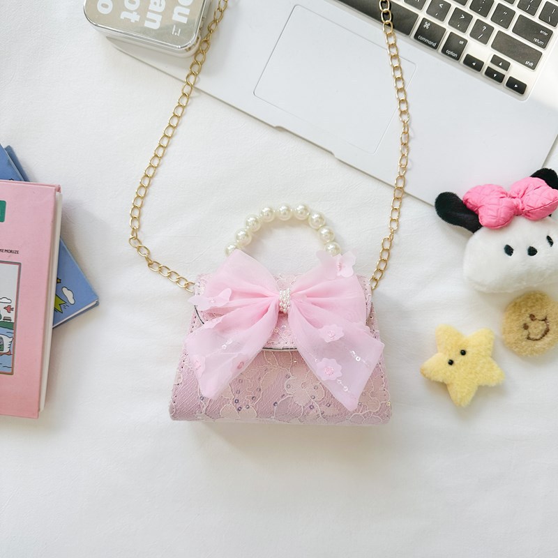 Bonito pequeño viento de la princesa viento bolso de perlas bolso de mano bolso de hombro para niños arco