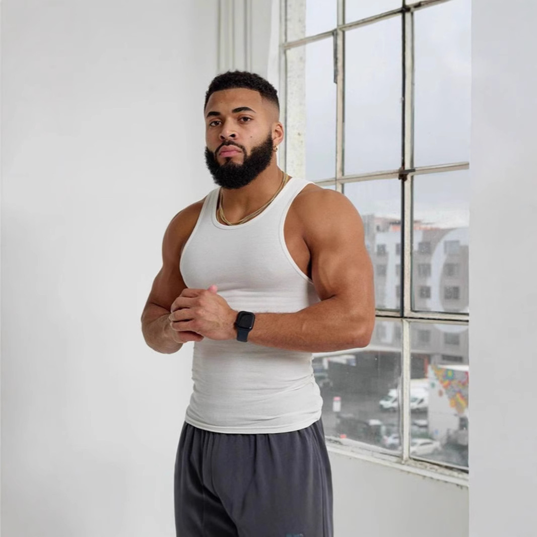 Chaleco de hombre verano americano delgado deportivo chaleco de color sólido fitness tendencia de los hombres casual elástico sin mangas camiseta