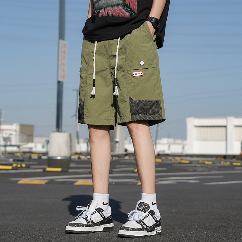 Pantalones cortos de seda de hielo de moda de verano para hombres. Pantalones de aire secos. Pantalones de cinco puntos. Pantalones de hombre grandes.