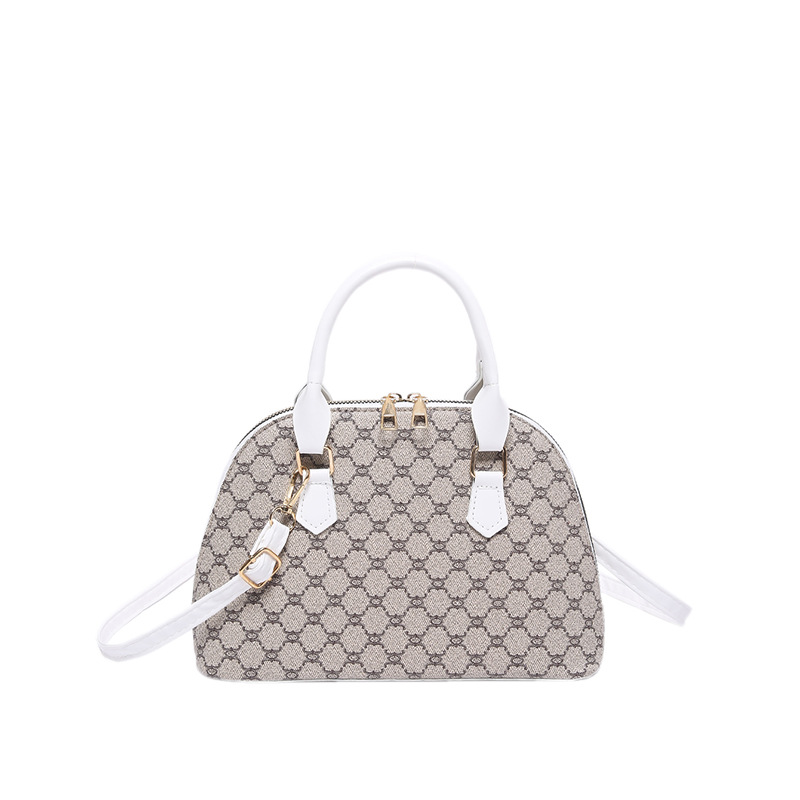 Bolso de moda simple 2024 primavera nueva bolsa de hombro de viaje de estilo extranjero bolso de mano casual bolso de concha de mujer