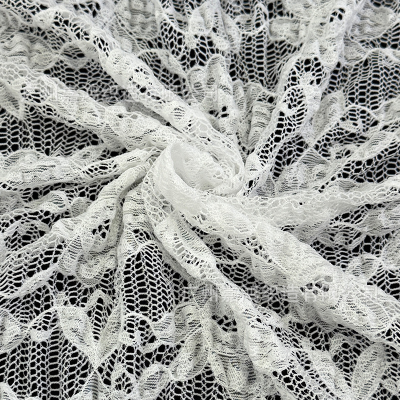 Tejido de encaje de burbuja plegado tela de encaje tridimensional base de encaje elástico fabricantes de ropa de mujer en stock