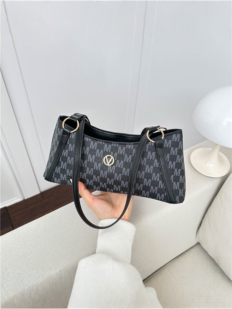 Bolso de mujer 2026 nueva letra impresa bolso de brazo de mujer bolso de hombro de viaje universal bolso de moda simple