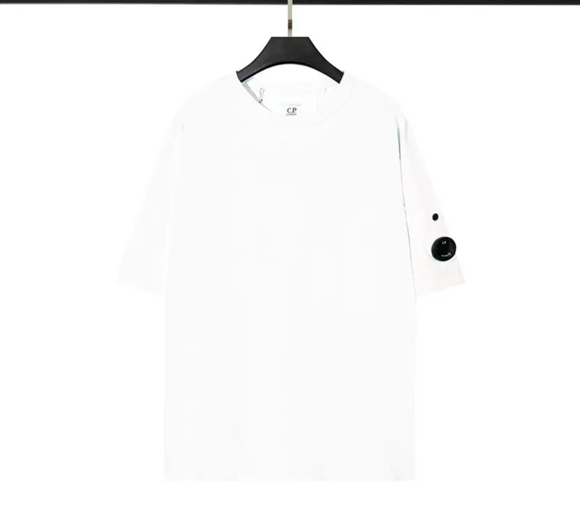 純色のカジュアルでゆったりした丸首カバーの男性服のコートのファッション英倫青年ファッションブランドの男性