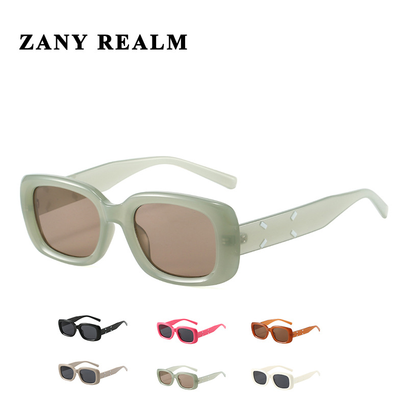 Xiaohongshu mismo estilo personalidad gafas de sol de montura pequeña gafas de sol de moda hip-hop nuevo color caramelo street shooting versión coreana al por mayor