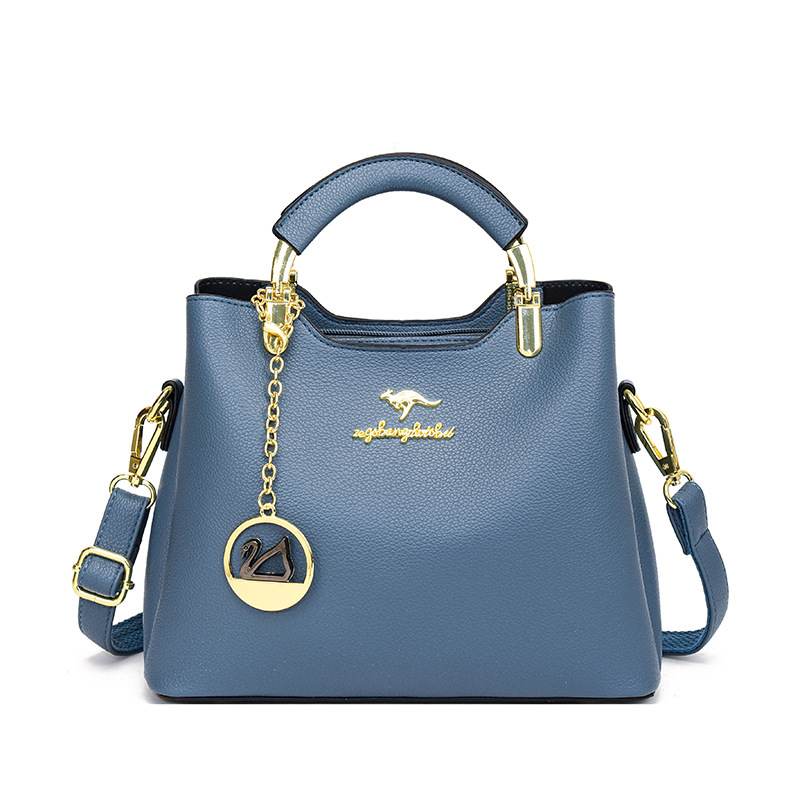 Bolsa de mano de lujo ligera multicapa de cuero suave de moda universal de moda moda moda de un solo hombro mochila