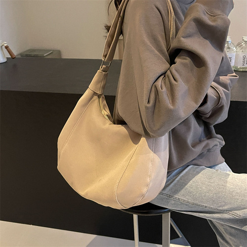 Canvas bag women's bag 2024 new solid color Ruiying fashion large capacity dumpling bag single shoulder crossbody commuter women's bag