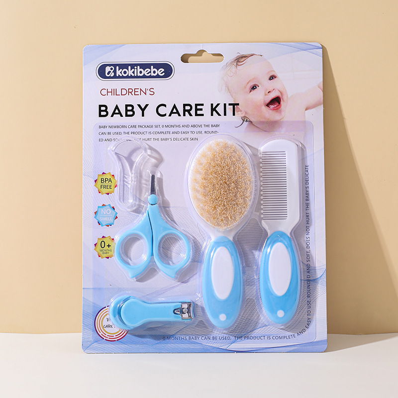 Envases en inglés transfronterizo Juego de cuidado de cepillo de peine de lana para bebés Tijeras de seguridad para bebés Herramienta de limpieza de cortaúñas