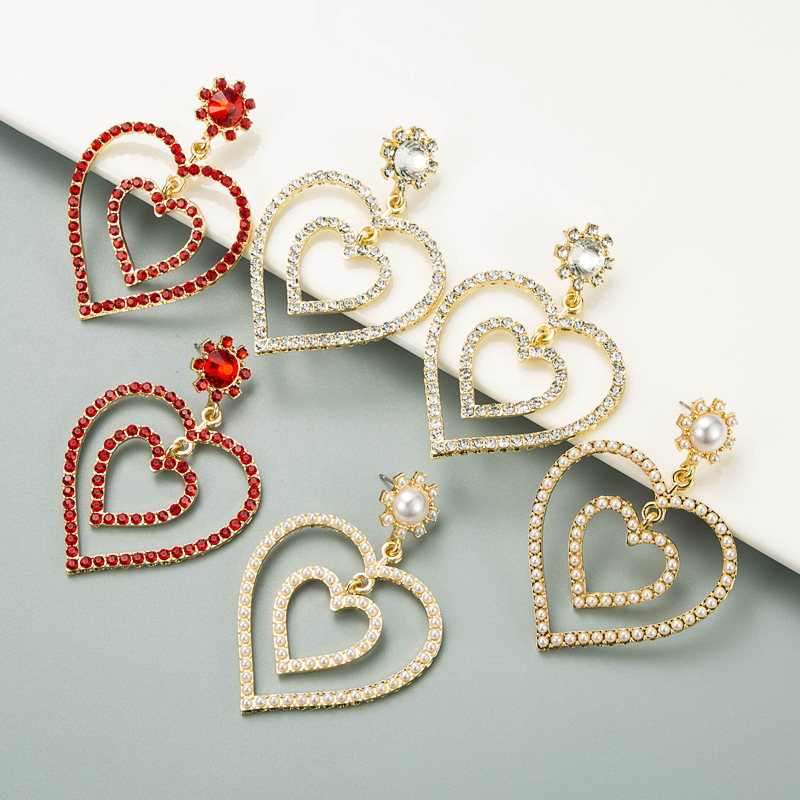 Creative Hollow Double Heart-shaped Earrings display picture 2