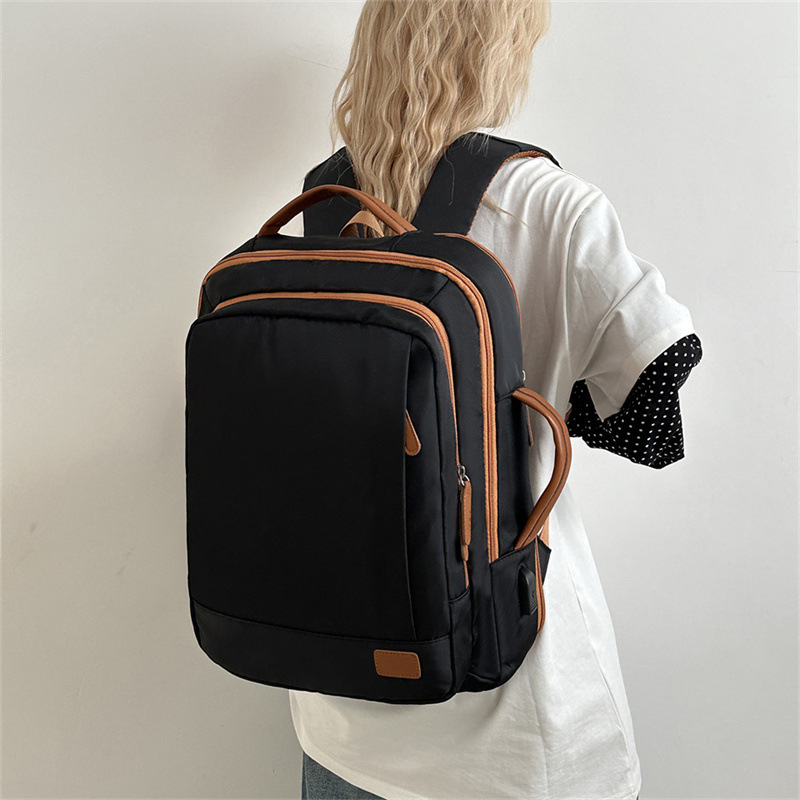 2025 primavera nuevo estilo impermeable casual simple moda salvaje mochila de gran capacidad para viajes mochila ligera