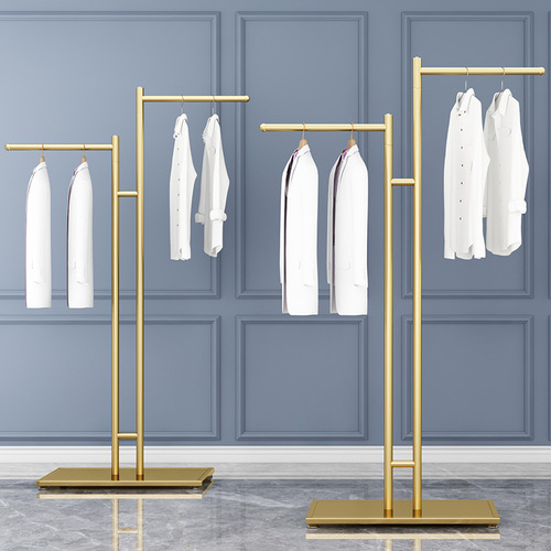 Clothing store display: freestanding island racks, men's and women's clothing racks, garment shelves, and kid's clothing hangers.