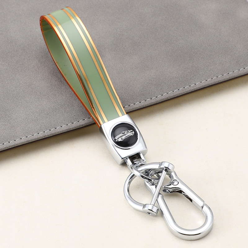 Cuerda de mano de silicona transfronteriza llavero de coche logotipo de coche apellido llavero anti-pérdida llavero de cuerda de mano de silicona duradera