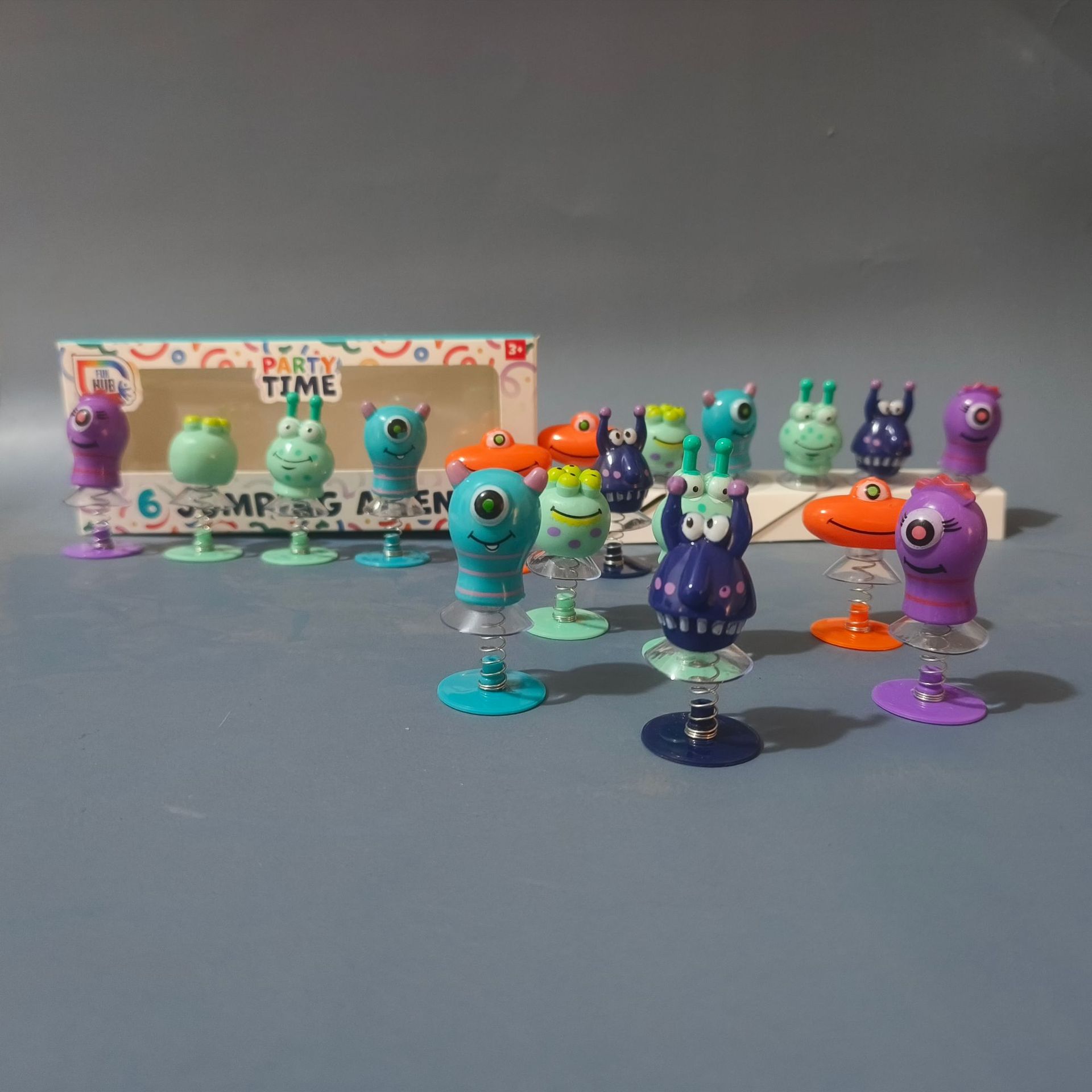 跨境大眼怪弹簧吸盘公仔怪兽跳跳乐动物小青蛙弹跳解发射器压玩具