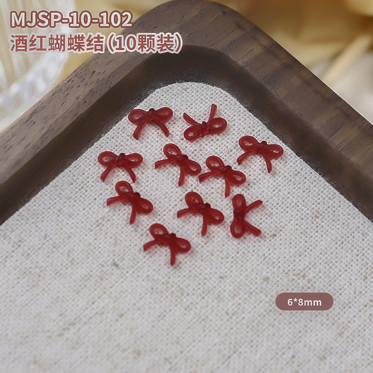 Explosiones de vino rojo flotante arco joyas de manicura línea simple arco uñas decoración pequeña al por mayor