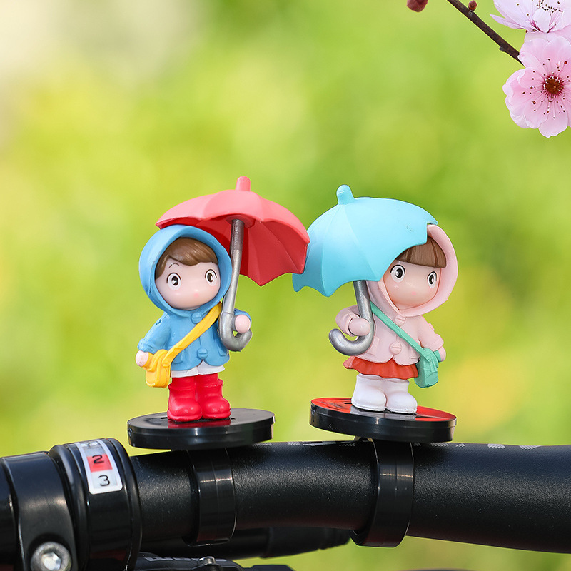 Nueva chica paraguas bicicleta tranvía decoración decoración correa creativa muñeca linda batería decoración de coche