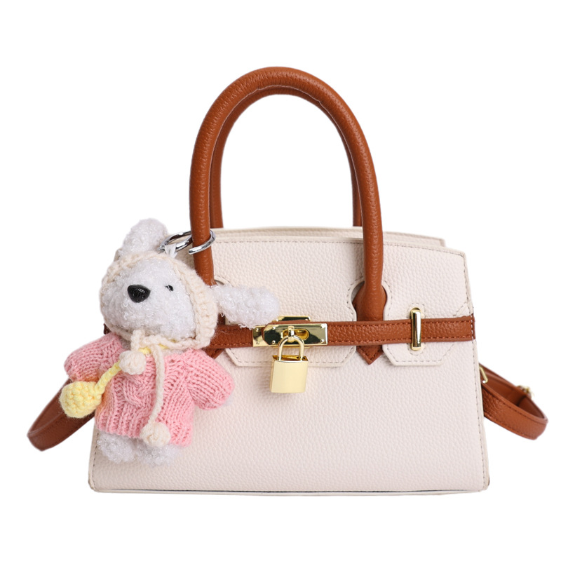 Coreano simple bolso de mano mujer 2026 primavera nueva bolsa de viaje diario texturizada bolso de mochila