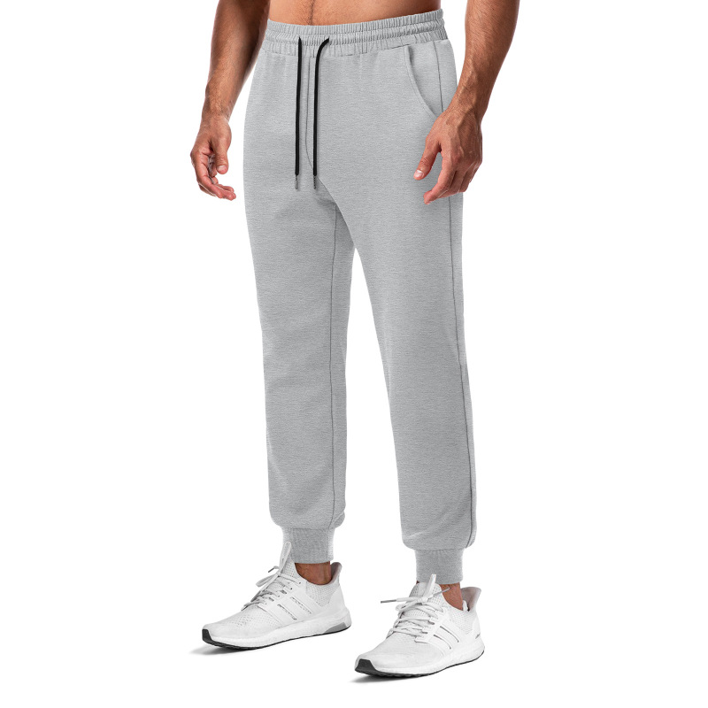 European and American style men's fitness and athletic long pants, solid color, breathable, suitable for running, training, casual wear, outdoor activities, and jogging European and American style men's fitness and athletic long pants, solid color, breathable, suitable for running, training, casual wear, outdoor activities, and jogging