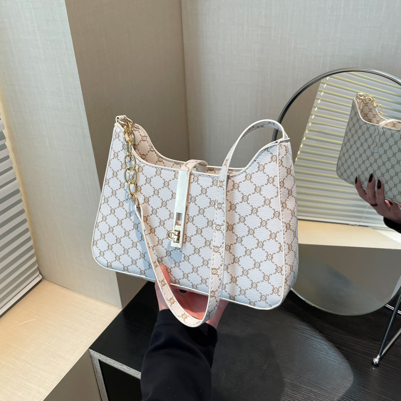 Bolsos de impresión simple debajo de la axila para mujeres 2025 nueva personalidad bolsas de bolsas de bolsas de moda bolsas de hombro casuales